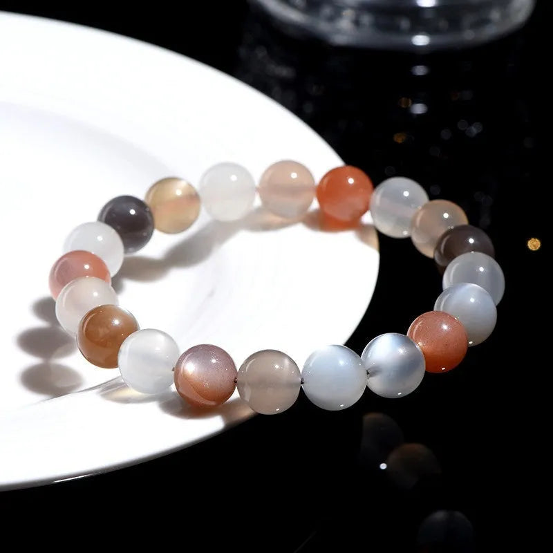 Natural colourful moonstone bracelet with 8mm beads in a single circle unisex design.