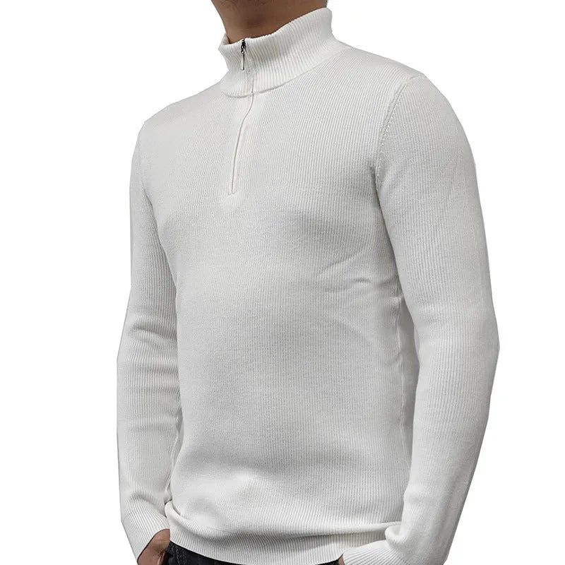 Man wearing a grey half-turtleneck zip-front sweater, a cotton blend pullover for casual wear.