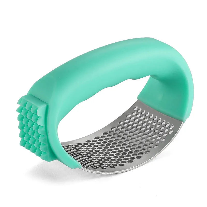 Stainless steel garlic press with polypropylene handles in modern design