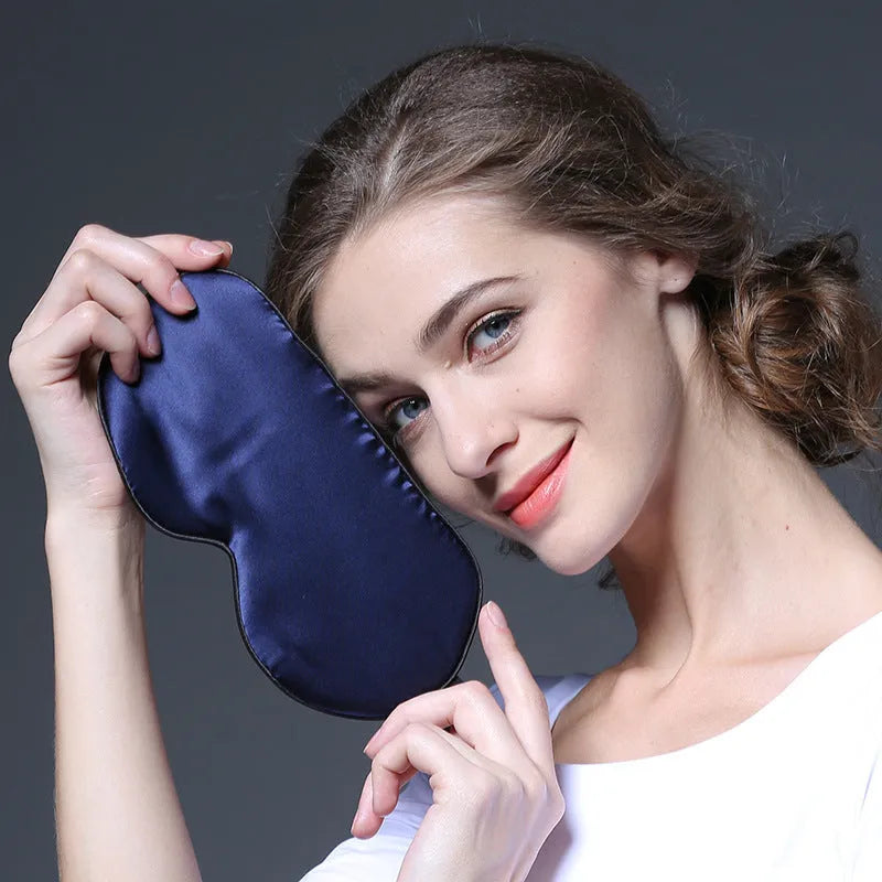 Double-sided mulberry silk sleep mask in various colours showing embroidered and printed designs.