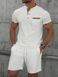 Men's grey cotton blend zip-up polo jacket and shorts suit set on a hanger.