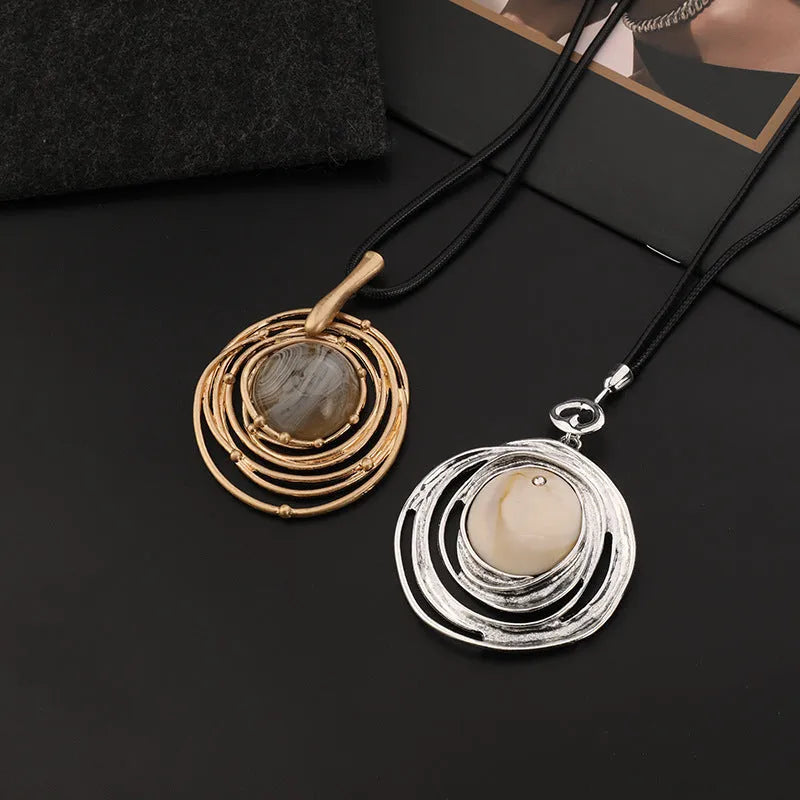 Women's vintage gold adjustable long necklace with geometric plaid alloy pendant on a snakeskin wax rope chain.