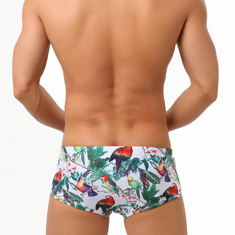 Men's flower-bird print swimming trunks in nylon fabric with cup cover detail