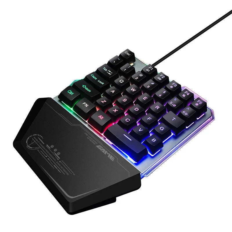 Black G40 Flow one-handed mechanical keyboard with RGB backlit keys on a desk