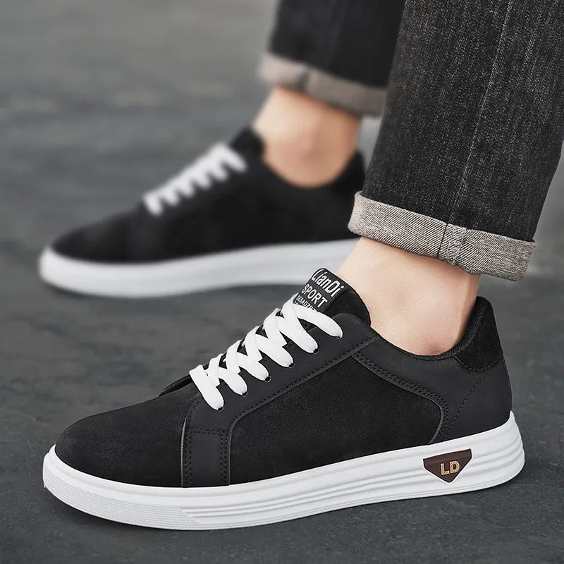Men's black snake pattern PU leather casual sneakers with round toe and flat rubber sole on a white background