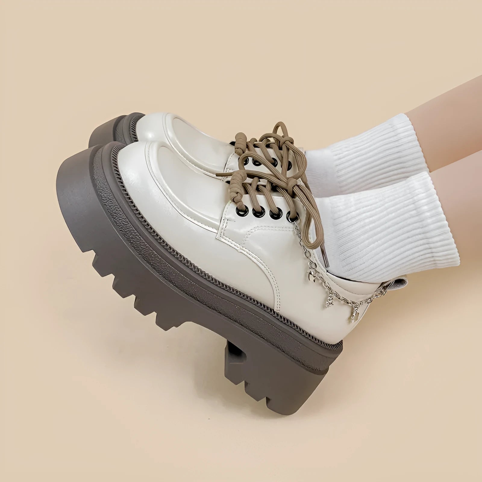 White women's platform Mary Jane shoes with chunky heel and XINGX bear design on round toe