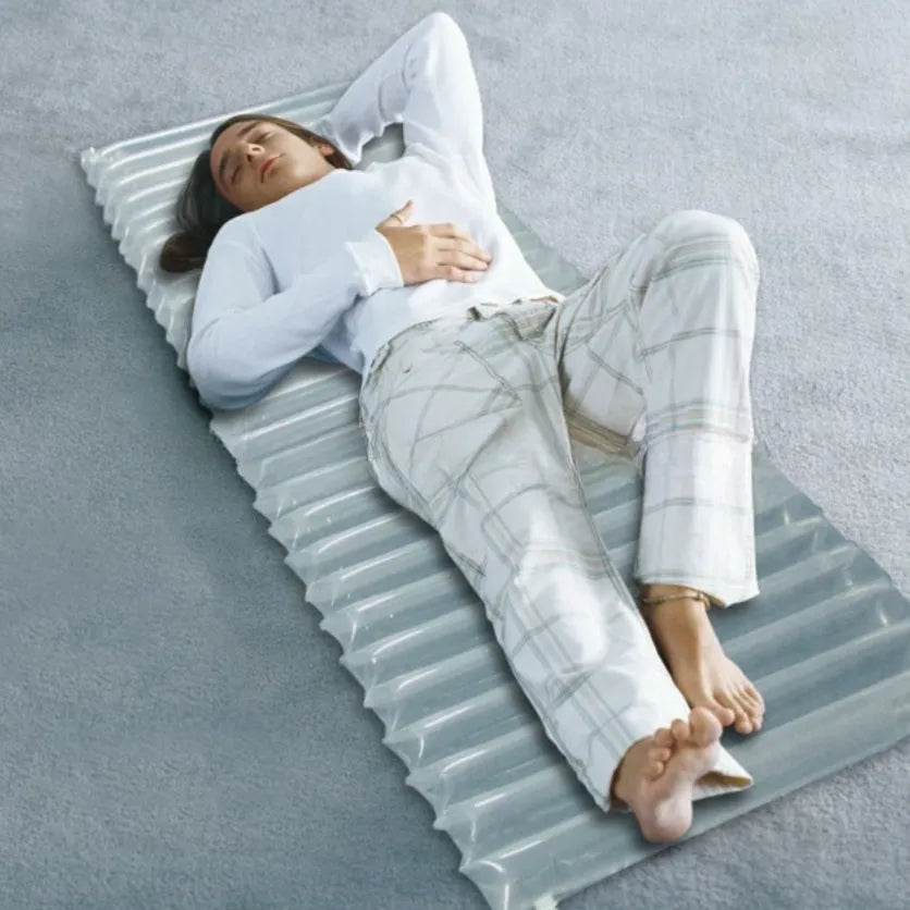 Transparent outdoor inflatable airbed measuring 200cm long by 60cm wide.