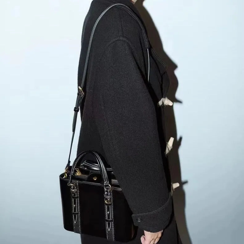 Women's olive green mini city messenger bag in PU leather with single shoulder strap and horizontal square shape