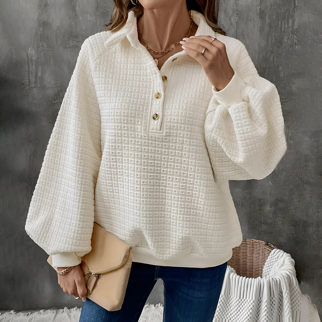 Milky white women's pullover sweater with a polo collar and textured knit fabric