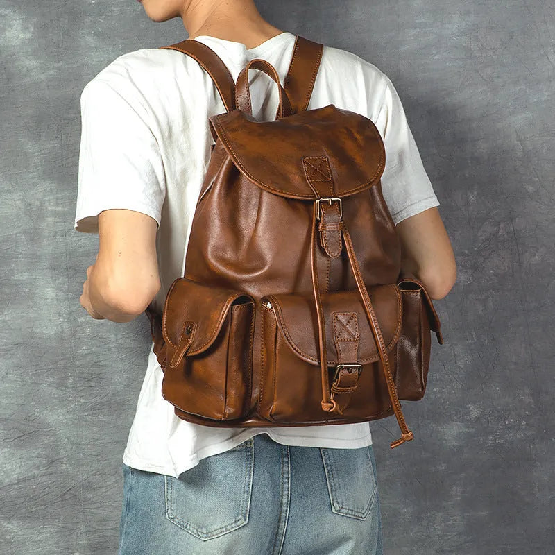Genuine leather retro backpack for men in light brown with geometric pattern and contrast stitching