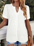 White women's V-neck T-shirt with hollow-out fabric detail and short sleeves on a hanger