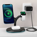 Black three-in-one magnetic wireless charging station for iPhone, AirPods, and Apple Watch on a desk