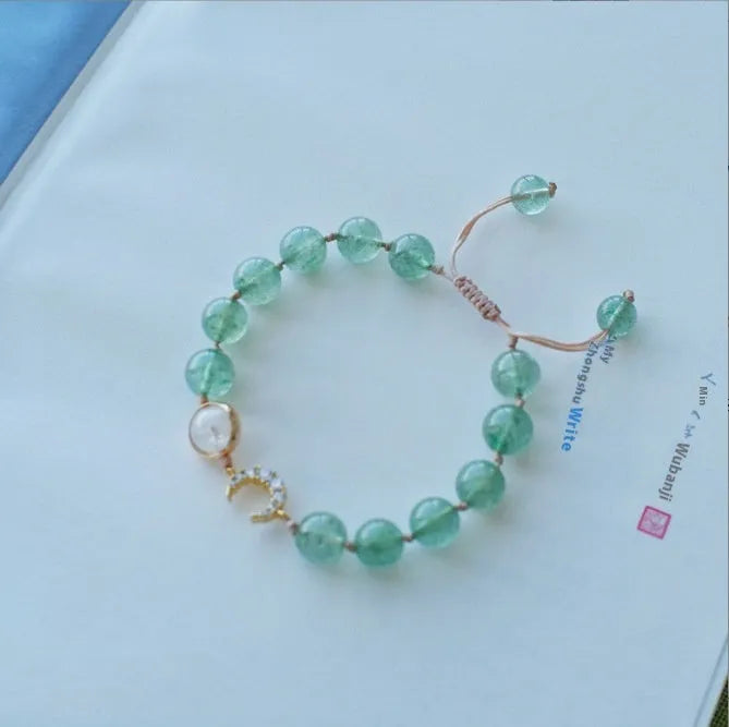 Handmade strawberry quartz crystal bracelet with green quartz moon charm for women
