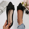Women's pointed knitted bow shallow mouth flat pumps in black with bow detail and rubber sole