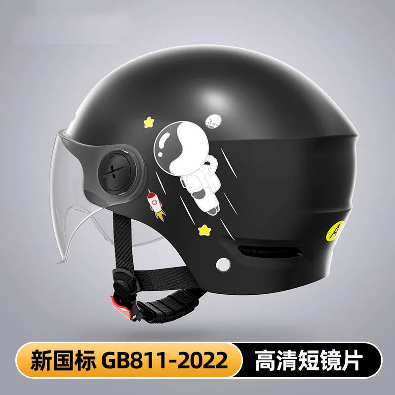 Khaki coloured motorcycle half helmet with a long mirrored visor attached on a table.