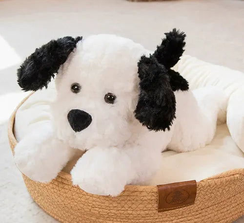 Lying dog plush toy in brown, white, and white and black, available in 35cm, 45cm, and 55cm heights.