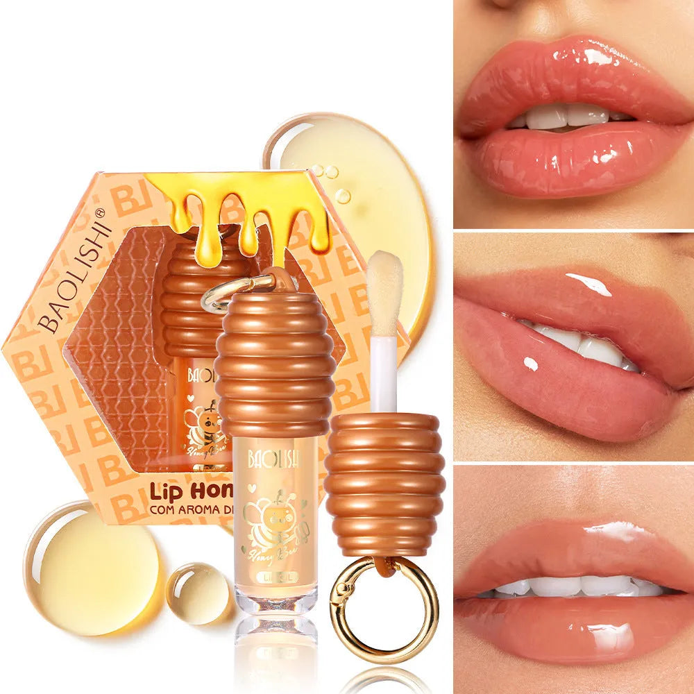 Honey Lip Gloss attached to a keychain for portable lip moisturising