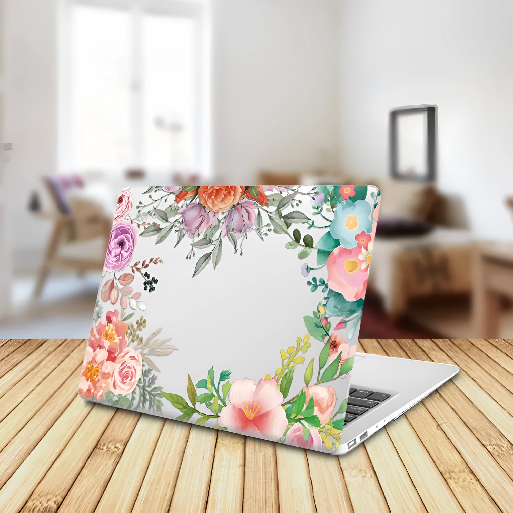 MacBook protective shell with floral pattern design covering laptop top and bottom surfaces