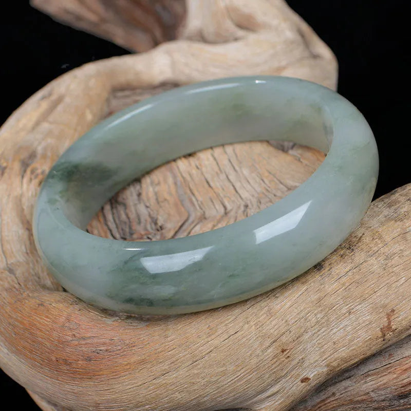Natural Jinsi Jade Chinese style bracelet showing traditional design with six size options from 52mm to 62mm inner diameter