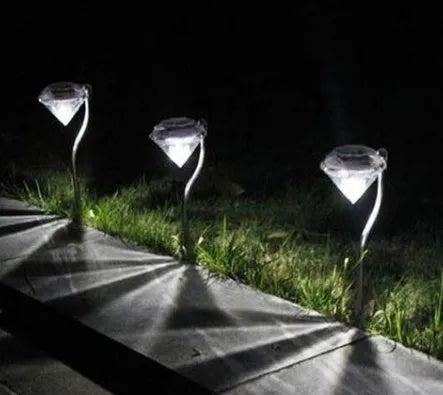 Solar powered diamond shaped garden LED light with solar panel for outdoor automatic evening illumination
