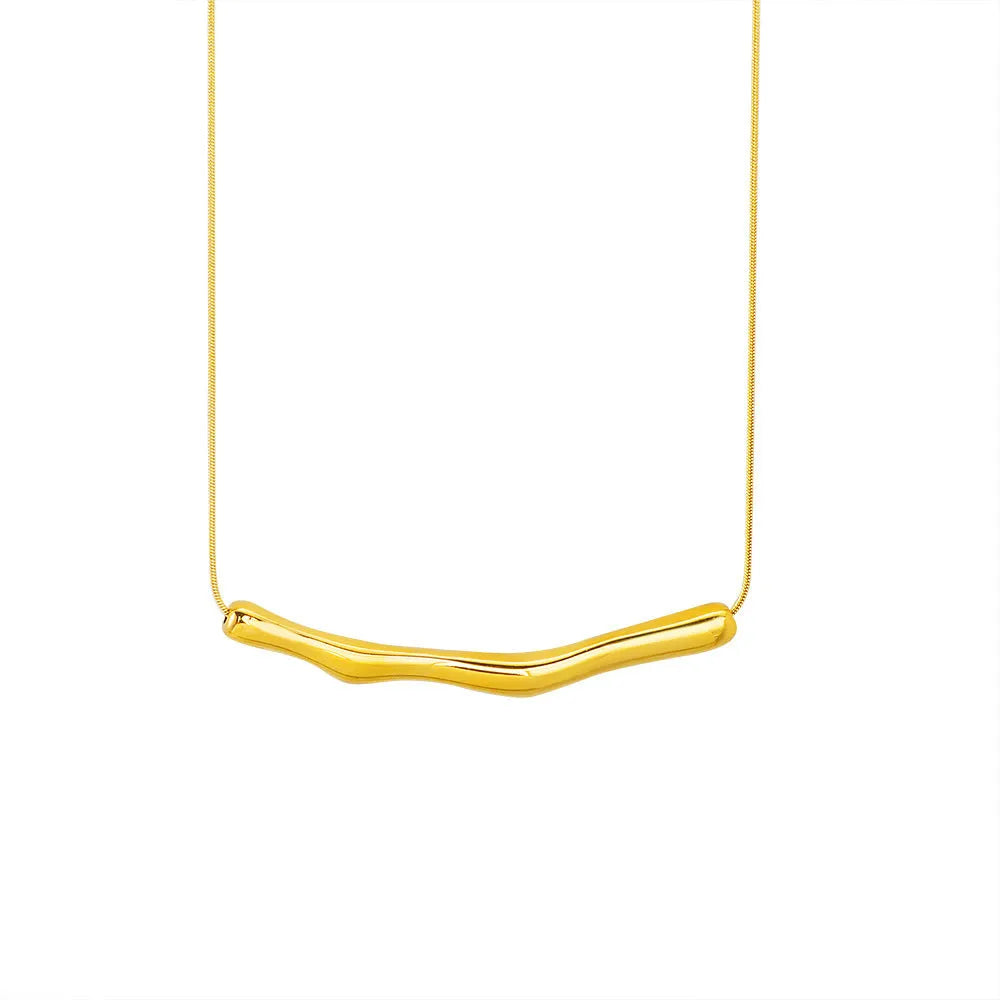 Close-up of a titanium steel women's necklace with an irregular pleated design in a gold electroplated finish.