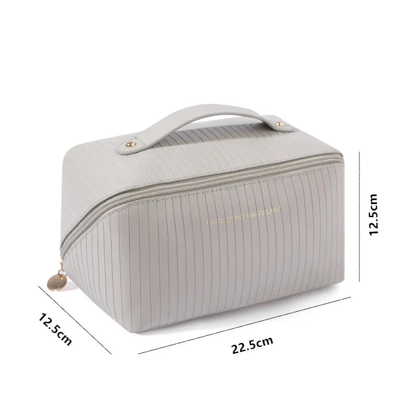 Vertical pattern pillow makeup bag in cubic shape with PU material, shown in available colours.