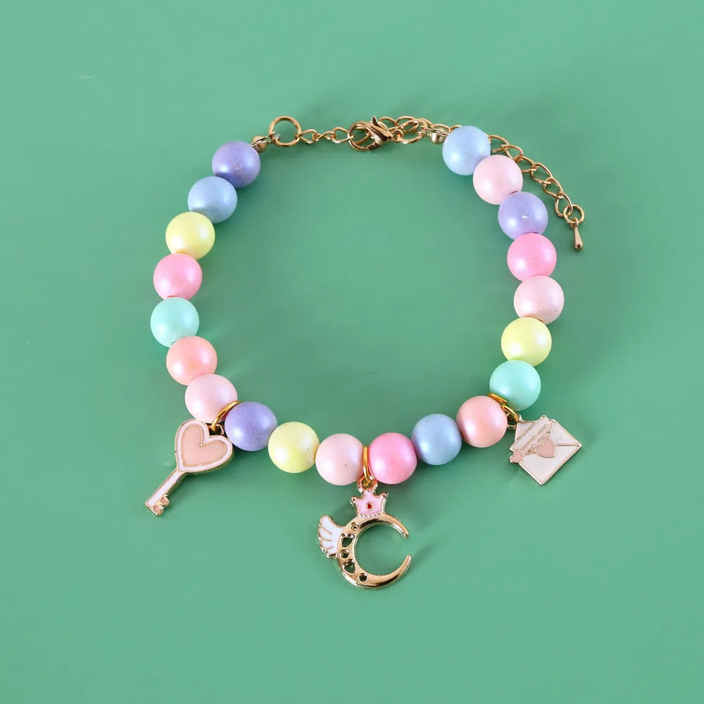 Colourful macaron-themed pet collar, necklace, and bracelet set in resin with adjustable sizing.