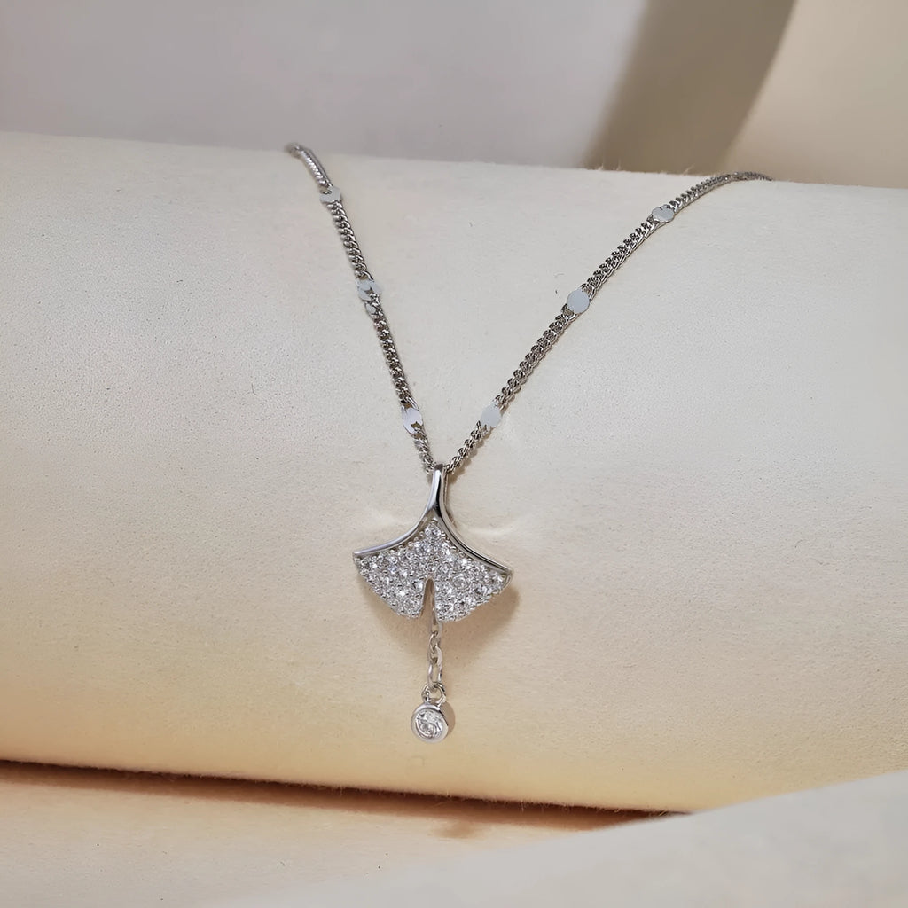 S925 sterling silver necklace with ginkgo leaf pendant in gold finish on curbs chain for women