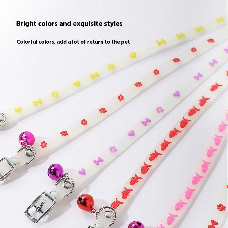 A luminous cat collar with an adjustable 29cm silicone rope and a metal bell, shown in one of four possible patterns.