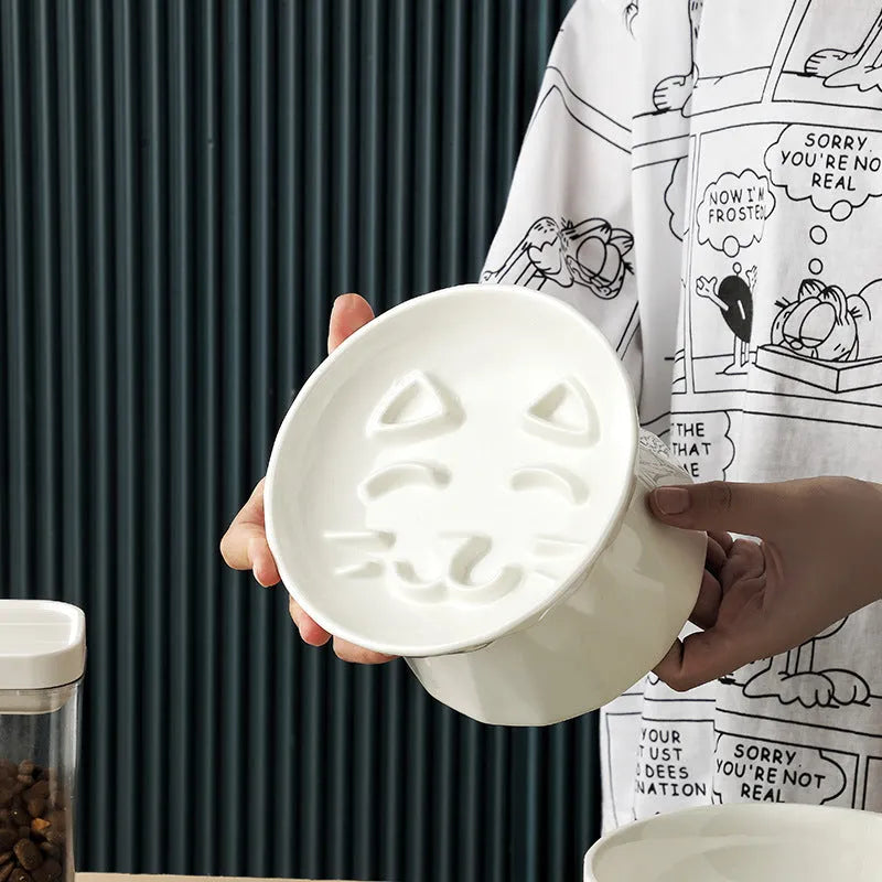 Ceramic tall cat bowl in neutral colour with raised design to protect spine during feeding