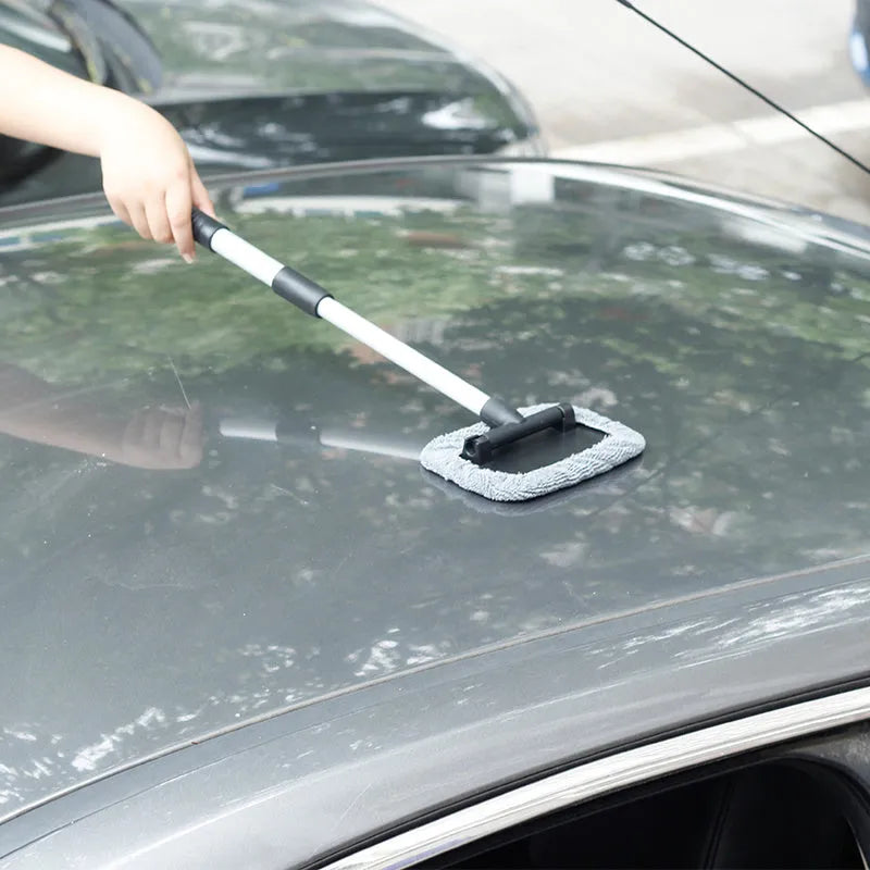 Black telescopic car windscreen cleaning brush with aluminium alloy rod, 180 degree rotating head and fibre cover, 15 x 10cm scraper