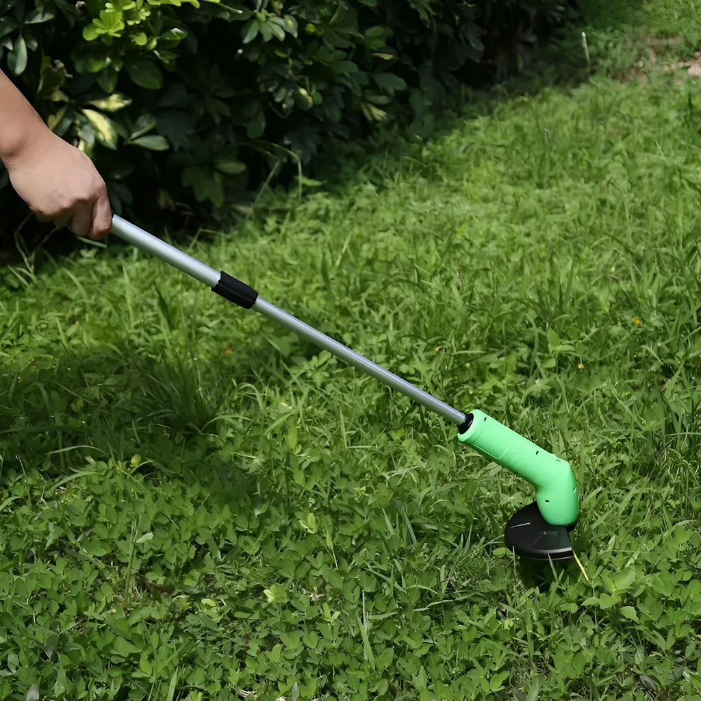 Cordless lawn trimmer with extension pole and protective debris shield for garden maintenance