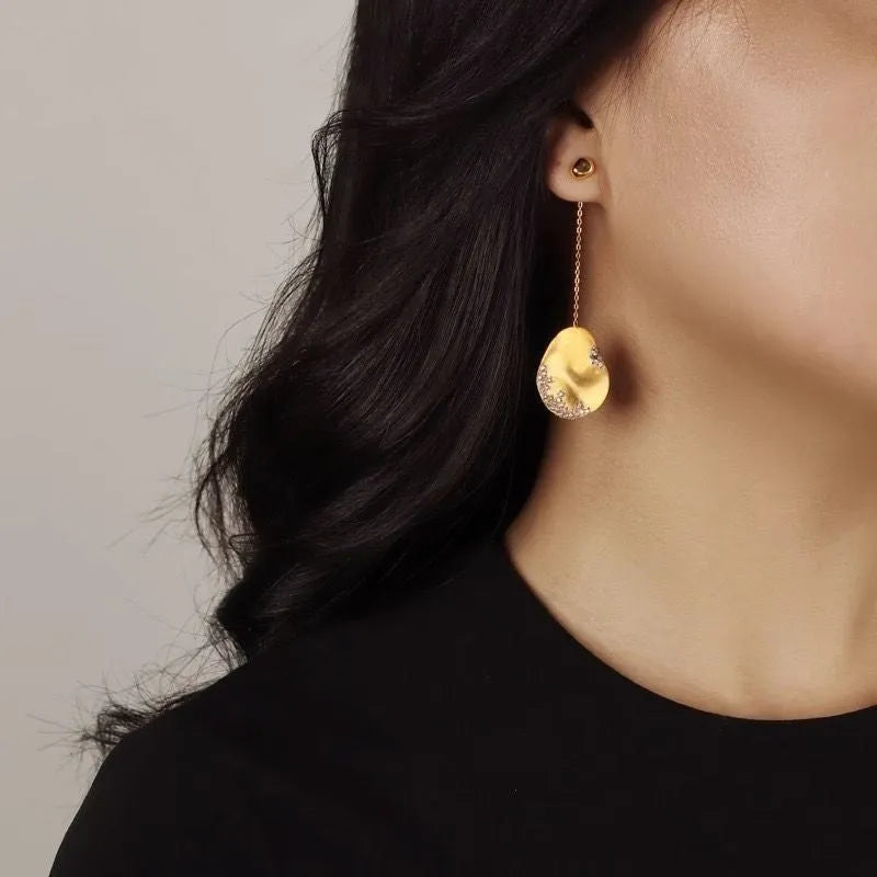Gold plated asymmetric floral earrings with zircon mosaic detailing in Chinese style design