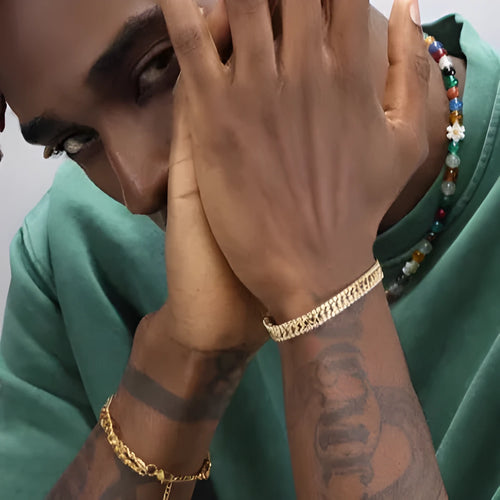 Gold tennis bracelet with hip hop styling featuring titanium steel construction and artificial gemstone inlay