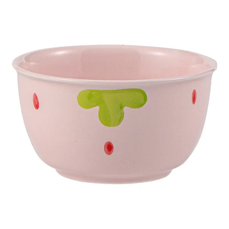 Strawberry-themed porcelain dinnerware set with plates, flower bowls, and microwave-safe spoons
