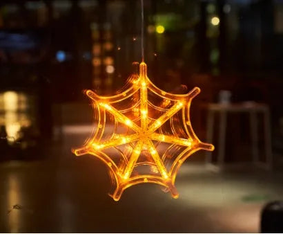 Seven Halloween themed battery-operated LED hanging lights with spider, pumpkin and ghost designs