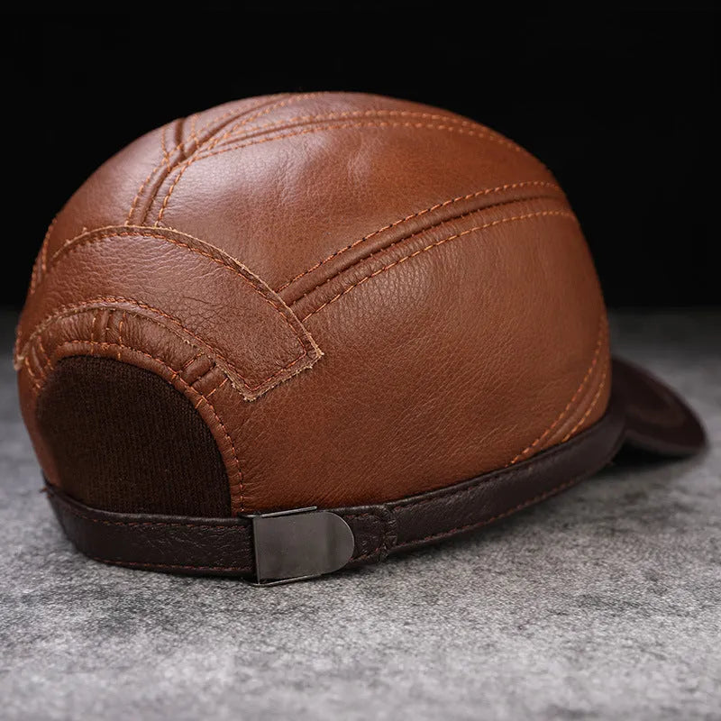 Men's cowhide leather baseball cap with flat short eaves and dome top, adjustable 56-60cm, shown in brown