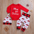 Girls' red Christmas suit with cartoon print top and trousers on white background