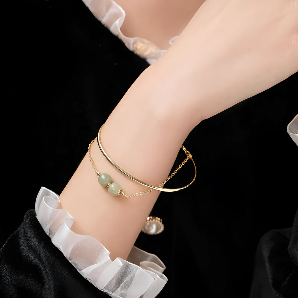 Hetian jade women's bracelet with gold inlay, shown in single, double, and three bead versions.