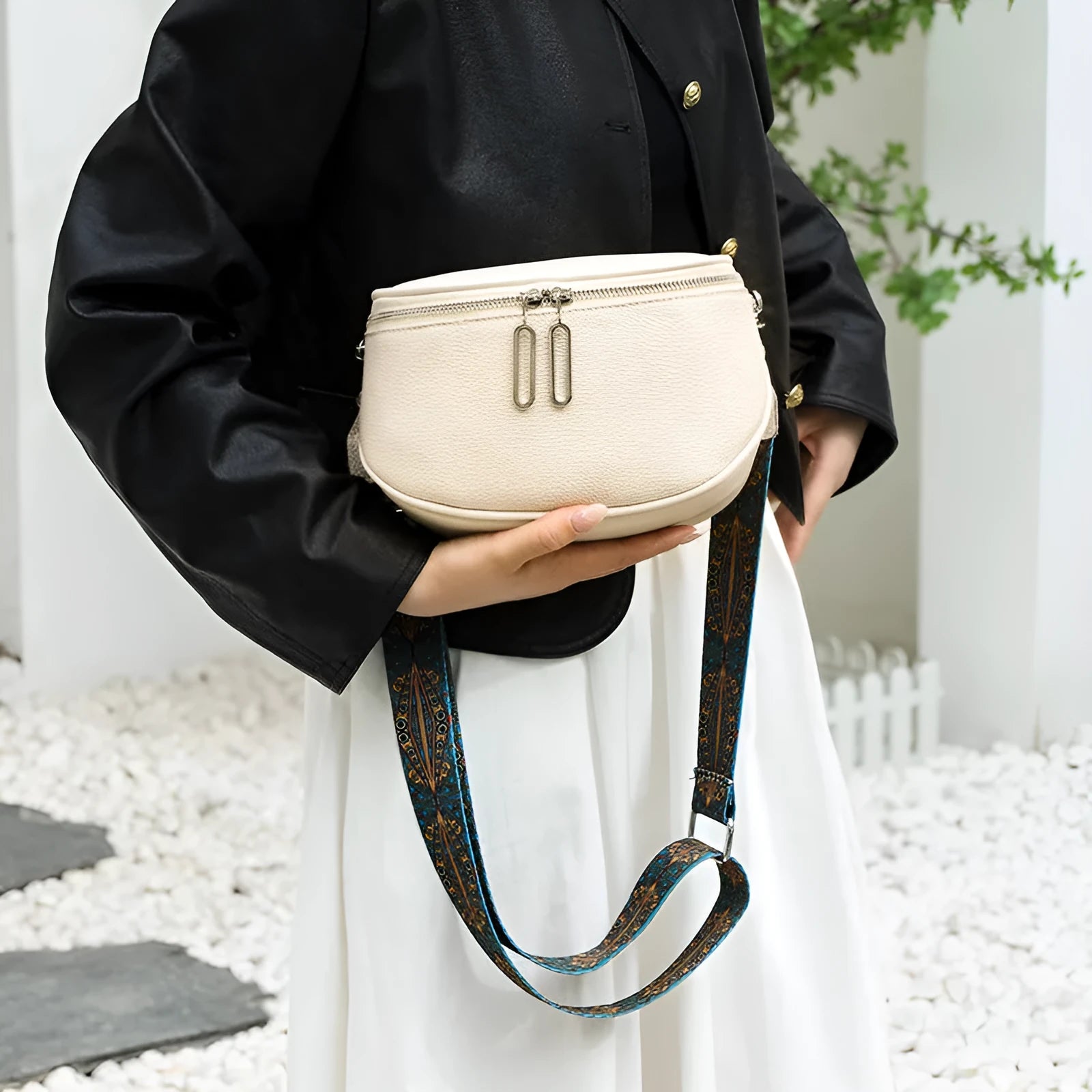 Green women's soft PU leather messenger bag with saddle shape and single shoulder strap.