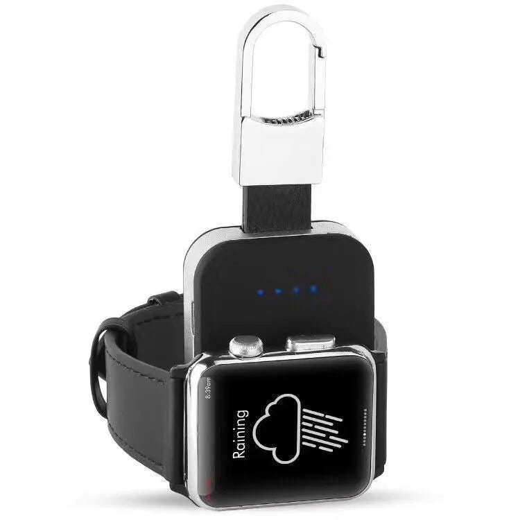 Black Apple Watch portable wireless power bank on a keyring showing compact size