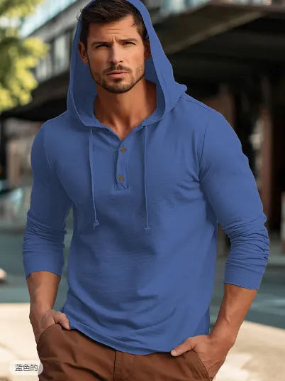 A dark blue cotton pullover hoodie with long sleeves on a hanger.