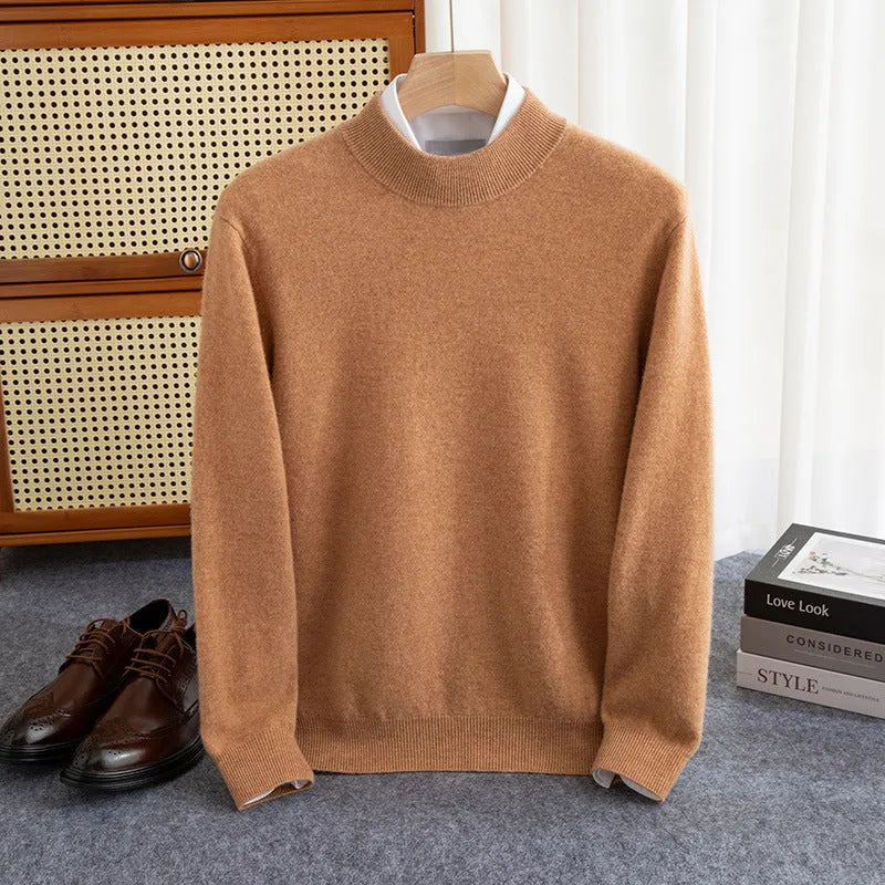 Man wearing a chunky knit half-turtleneck wool sweater in a loose fit.