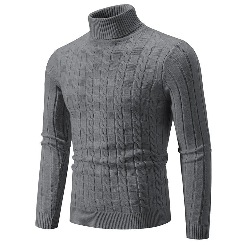 Man wearing a beige slim-fit chenille turtleneck sweater with a twist stitch texture.