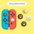 Silicone sleeve and cat claw button caps for Nintendo Switch Lite Joy-Con in various colours.