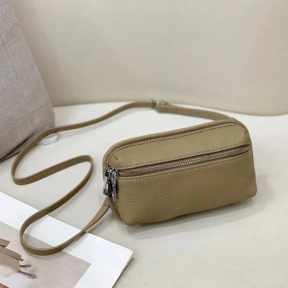 Women's mini crossbody bag in solid colour top grain leather with patchwork detail, horizontal square shape, retractable handle