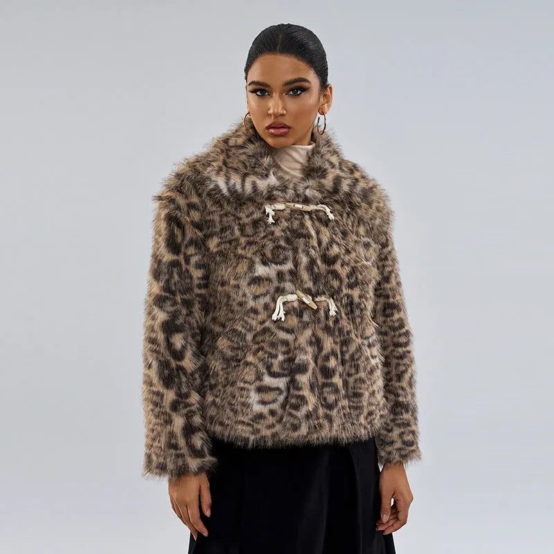 Women's leopard print polyester coat with a buckle lapel closure on a hanger