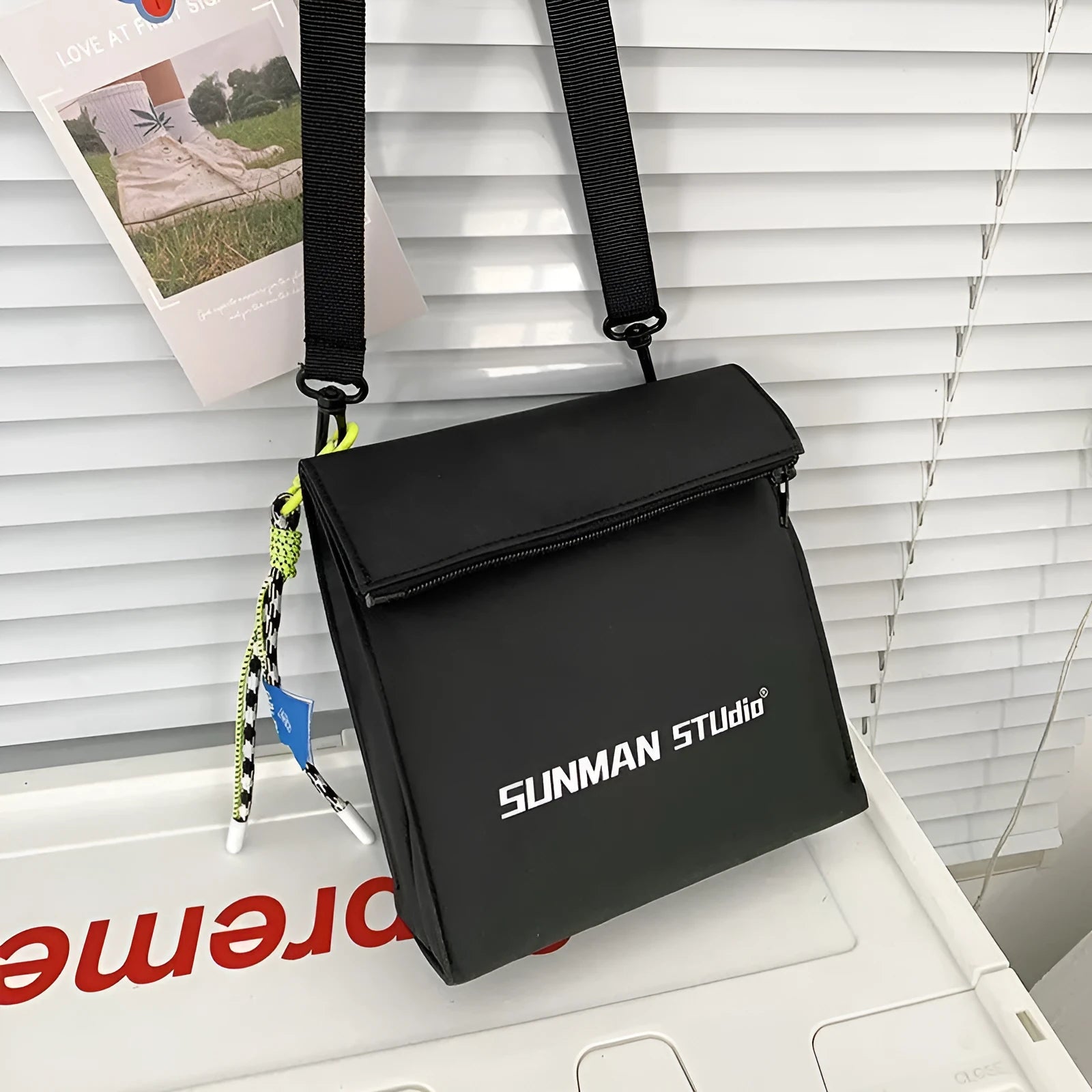 Simple all-match messenger bag backpack in polyester with adjustable crossbody strap, showing sewing line detail