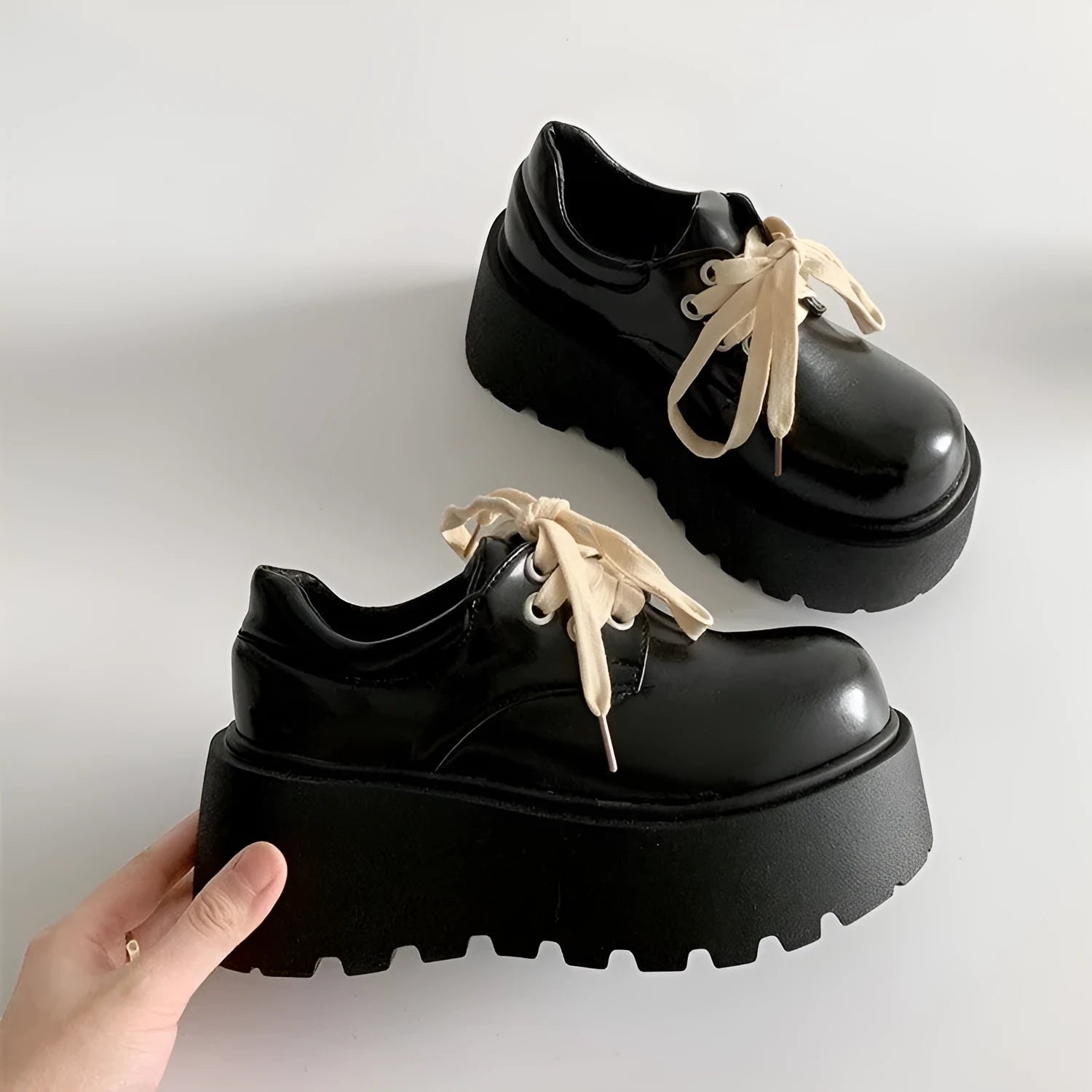 Matte black women's lace-up shoes with a thick rubber sole and a 6-8cm English muffin heel.