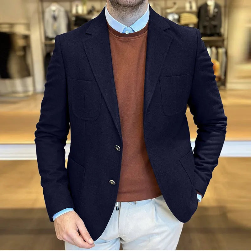 Man wearing a loose-fit army green cotton retro suit jacket, showing front and side details.
